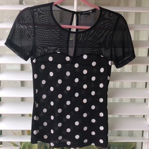 Polka dotted black half sheer top